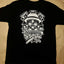 Black t-shirt with a white graphic design 