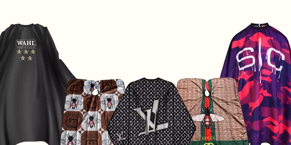 Collection of various hairdressing aprons with different designs and brands.