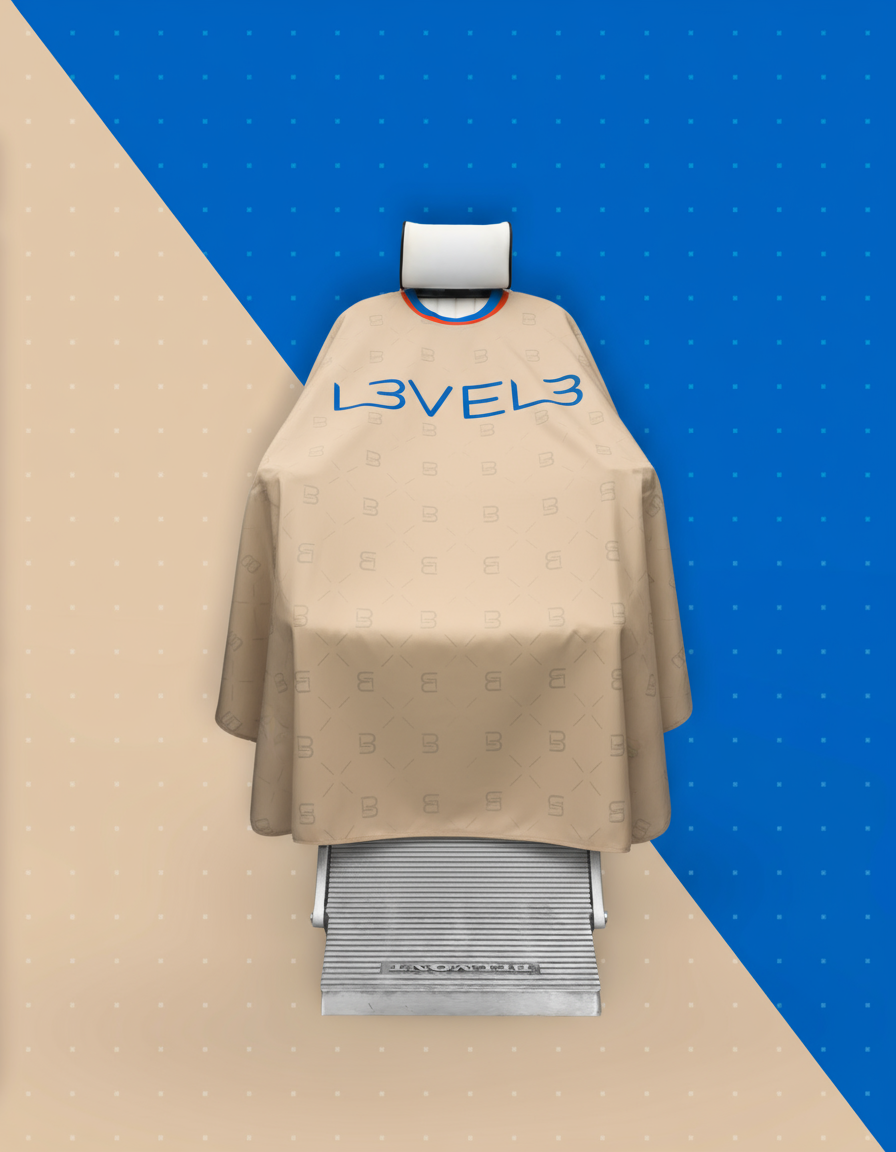 Beige hairdressing cape with 'L3VEL3' branding on a blue and beige background